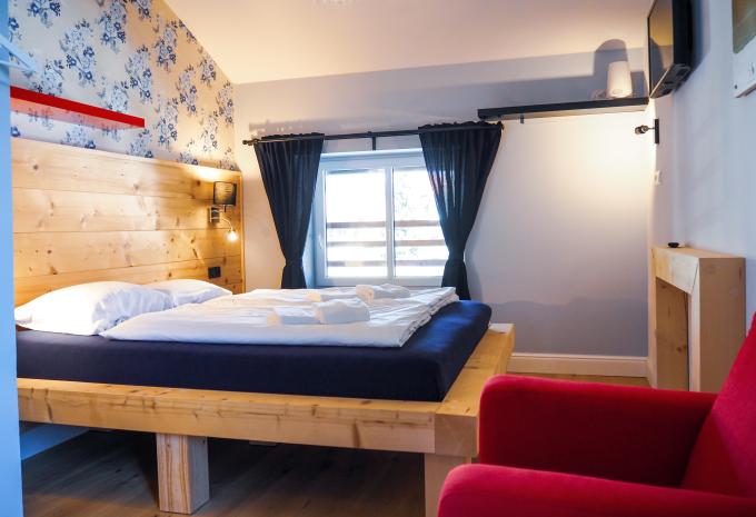 Zimmerbeispiel: Doppelzimmer Alpenliebe Queensize-Bett Zimmerbeispiel: Doppelzimmer Alpenliebe Queensize-Bett