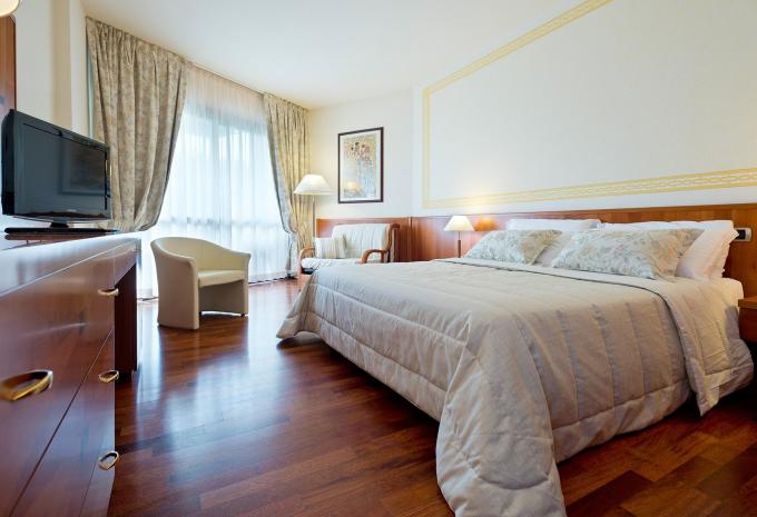 Esempio di camera tripla "Deluxe balcone“