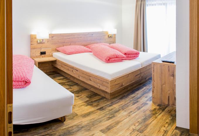 exemple d'une chambre de 3 lits balcon