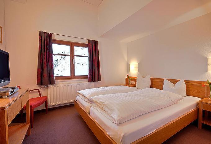 Exemple de chambre, appartement «Appartement Confort Famille» Exemple de chambre, appartement «Appartement Confort Famille»